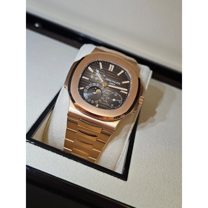 _patek_philippe__nautilus__571_1694599122_9b9276af_progressive